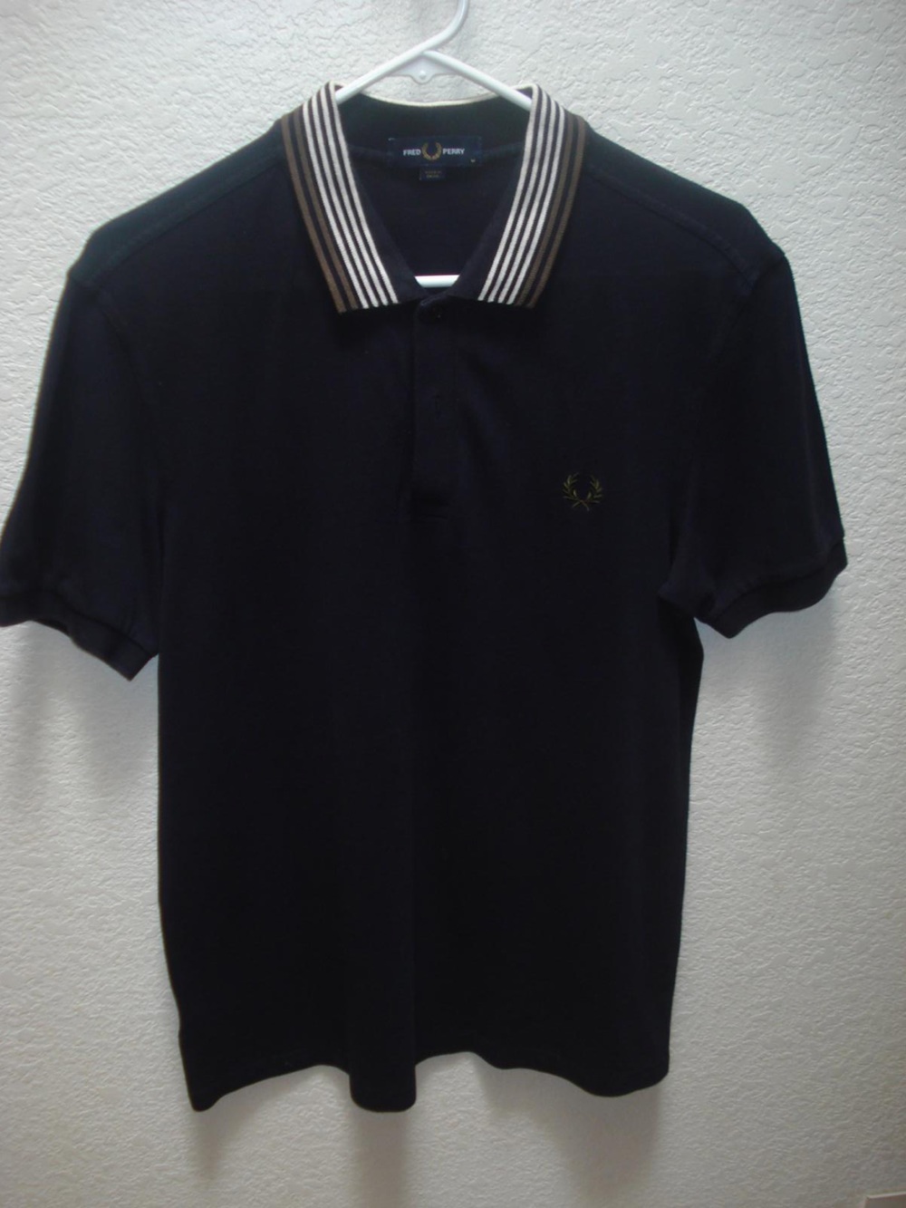 Fred Perry Navy Polo with Gold Laurel Emblem